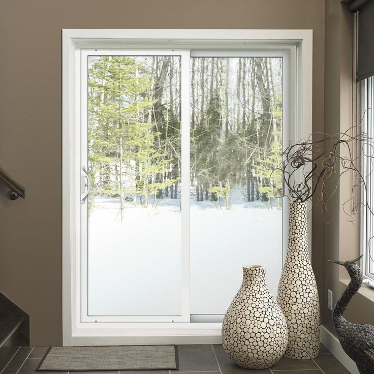 JELD-WEN 96-in x 80-in 4-9/16-in Low-e White Vinyl Sliding Right-Hand Sliding Double Patio Door Screen Included