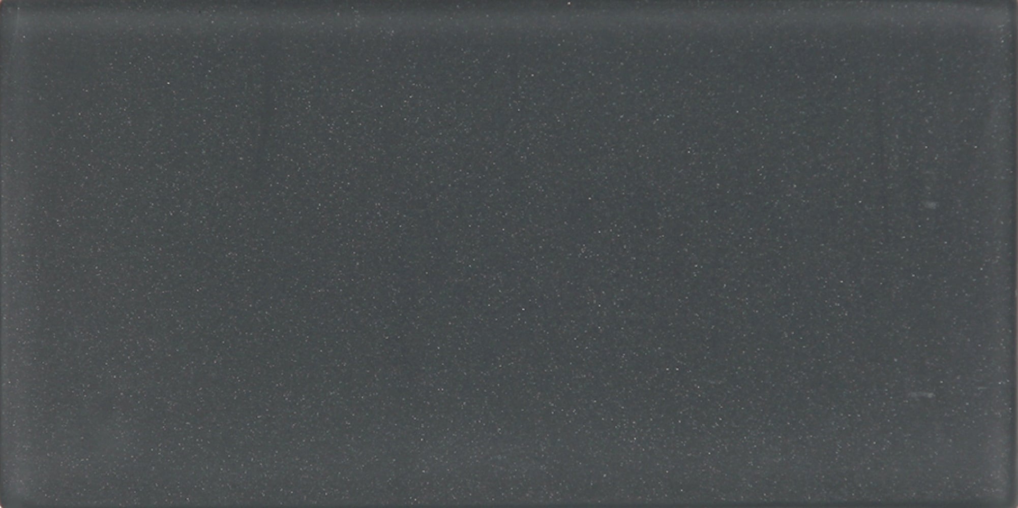 A single green leaf against a white background.