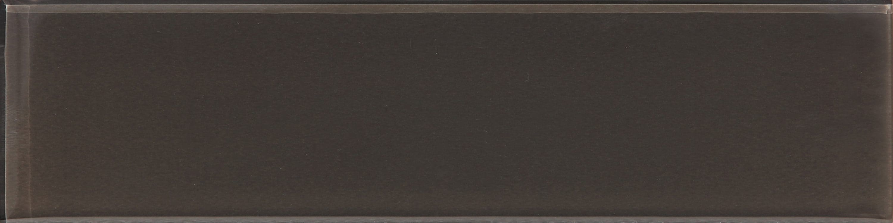 A single green leaf against a white background.