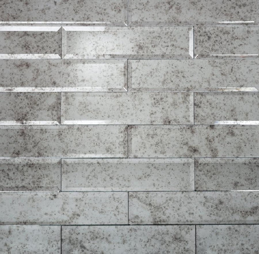 A single green leaf against a white background.