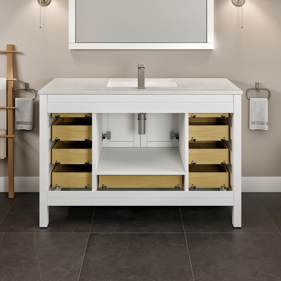 A single green leaf against a white background.