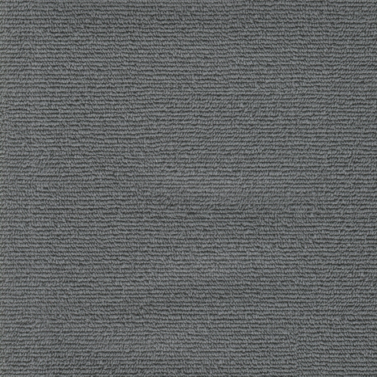 A single green leaf against a white background.