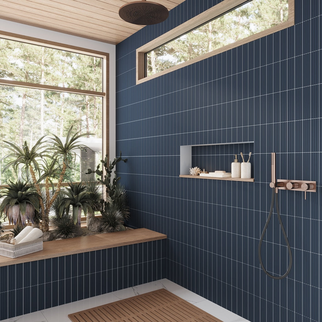 A single green leaf against a white background.