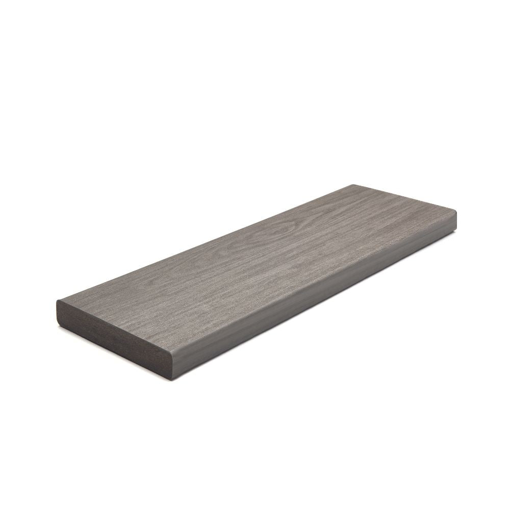 A single green leaf against a white background.