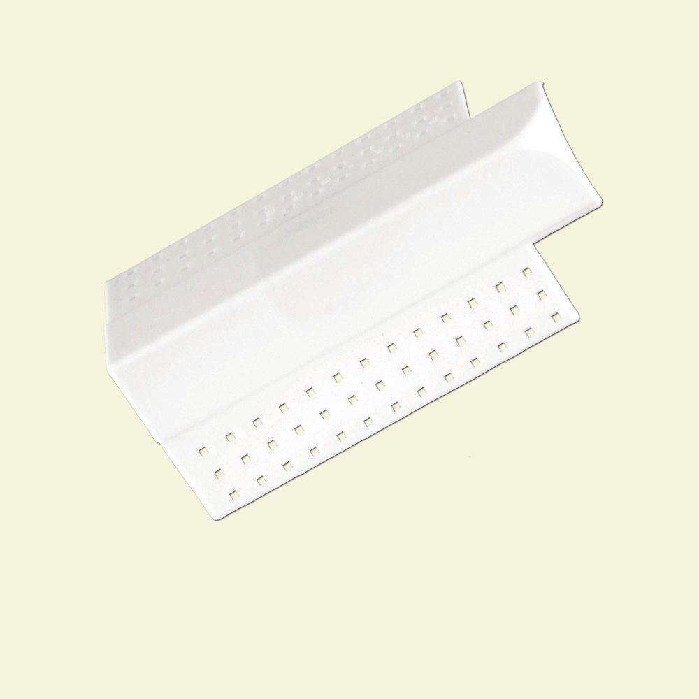 A single green leaf against a white background.