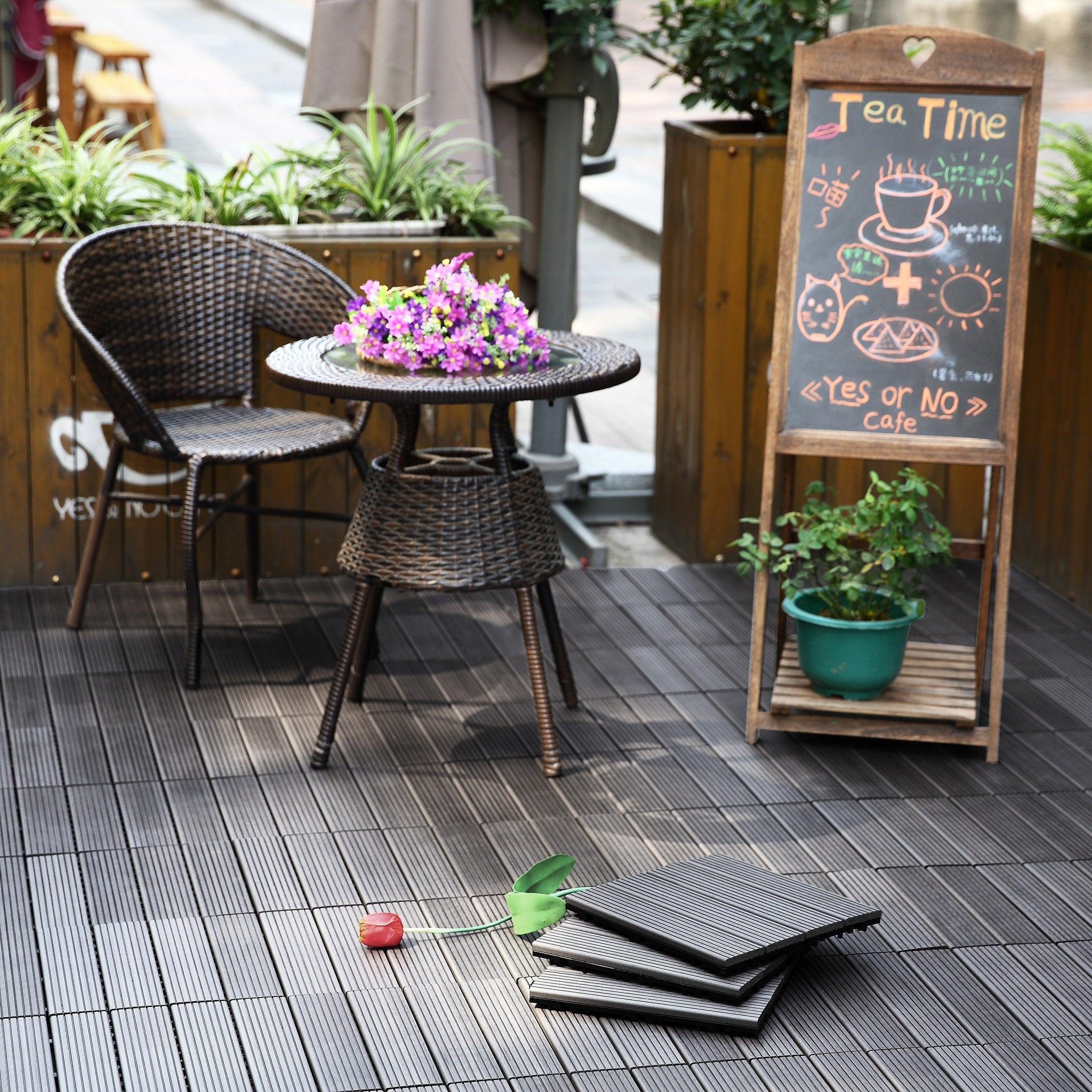 A single green leaf against a white background.