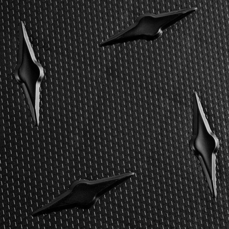 A single green leaf against a white background.