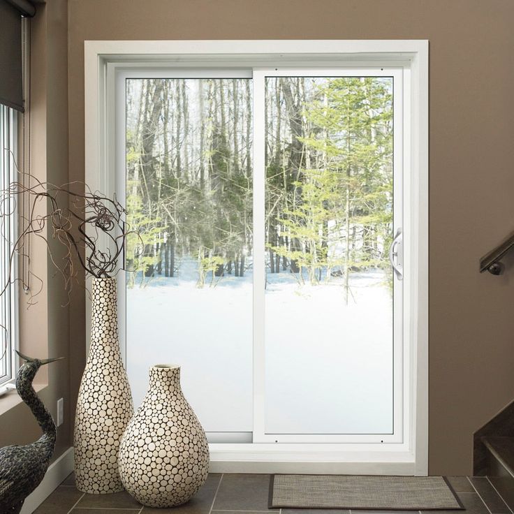JELD-WEN 96-in x 80-in 4-9/16-in Low-e White Vinyl Sliding Left-Hand Sliding Double Patio Door Screen Included
