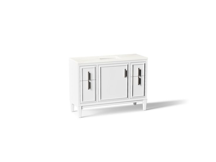 A single green leaf against a white background.