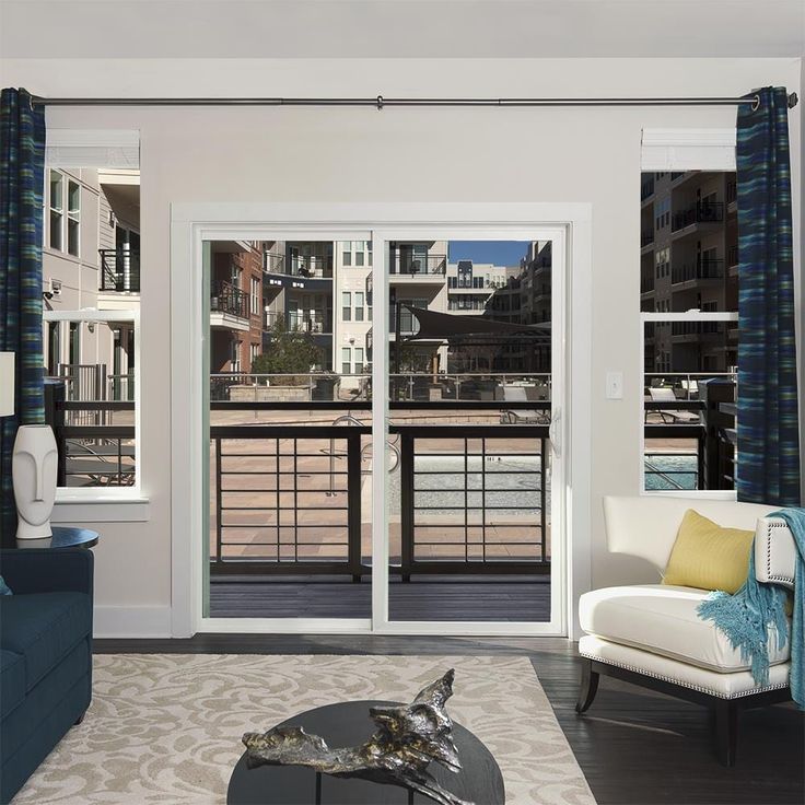 JELD-WEN V-4500 60-in x 80-in 4-9/16-in Low-e Argon White Vinyl Sliding Left-Hand Sliding Double Patio Door Screen Included