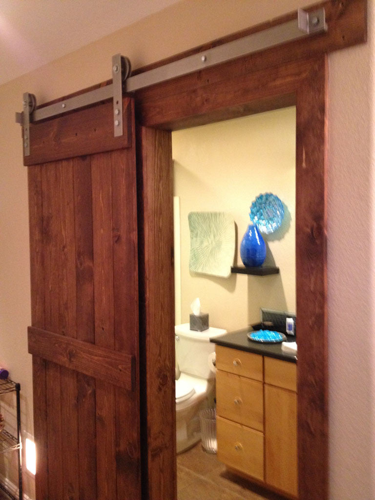 Krosswood Doors 30 in. x 80 in. 2-Panel Solid Core Unfinished Knotty Alder Interior Barn Door Slab