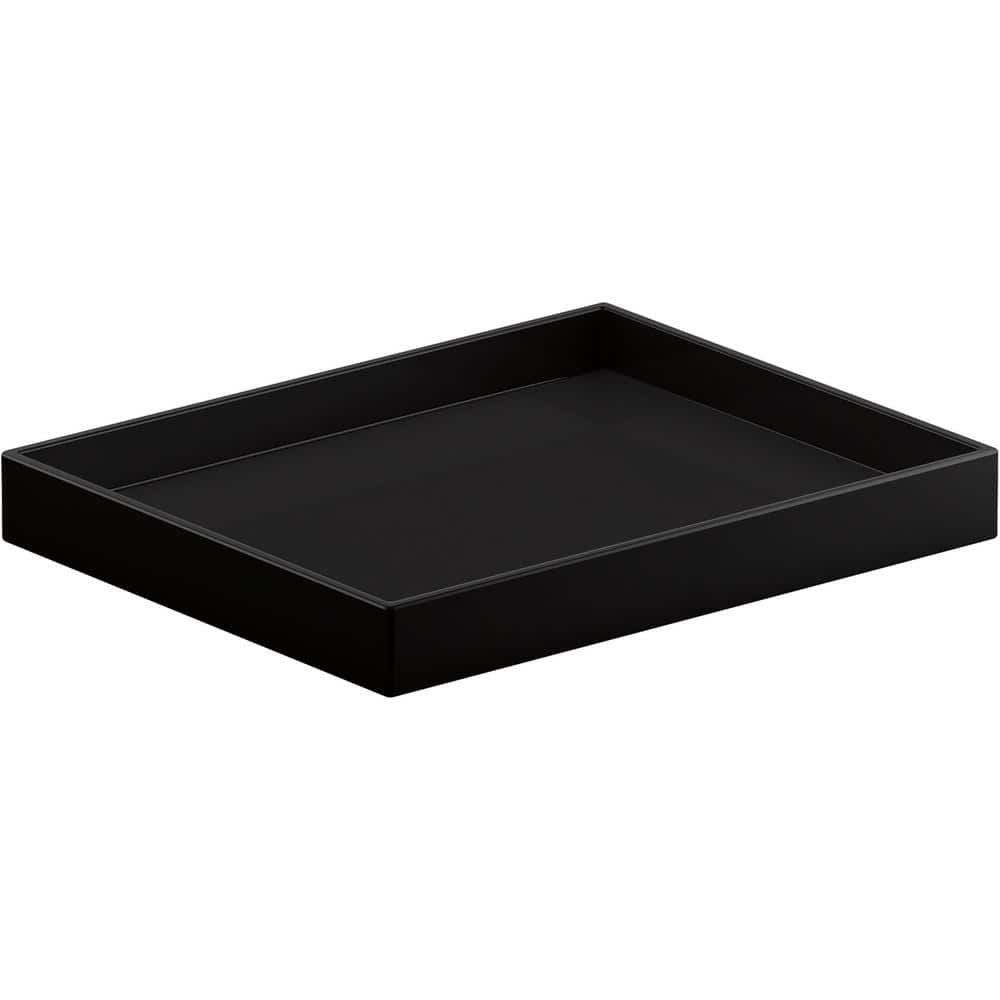 A single green leaf against a white background.