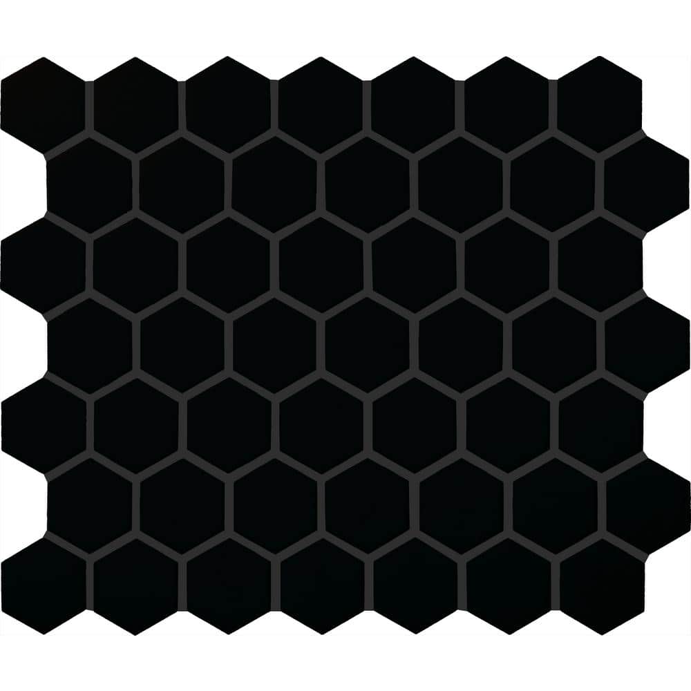 A single green leaf against a white background.