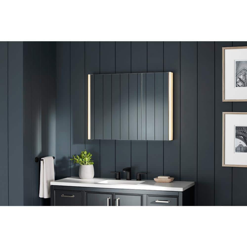 A single green leaf against a white background.