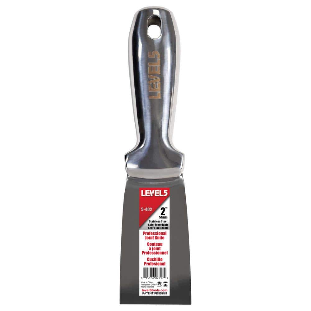 A single green leaf against a white background.