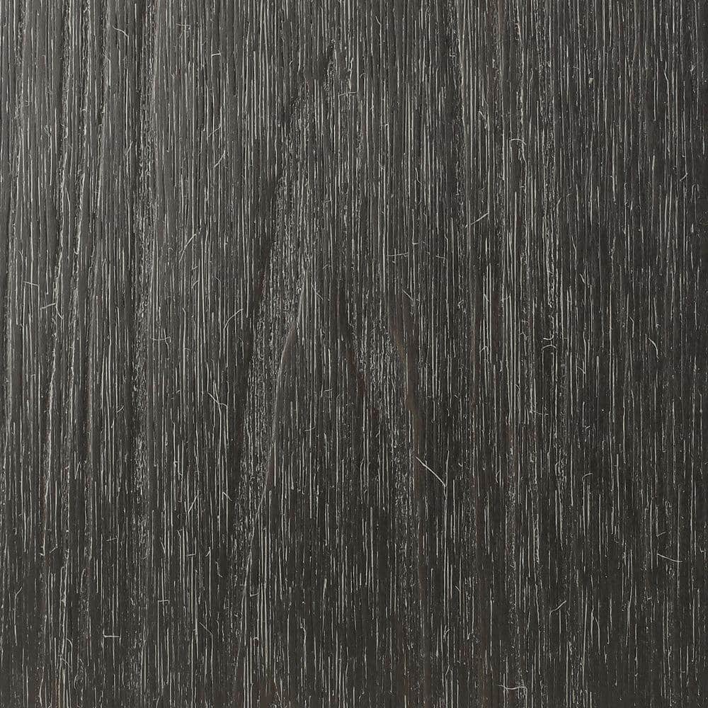 A single green leaf against a white background.