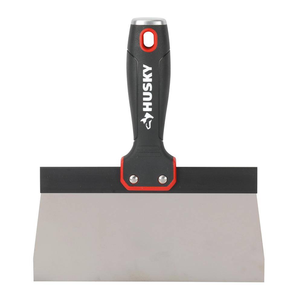 A single green leaf against a white background.