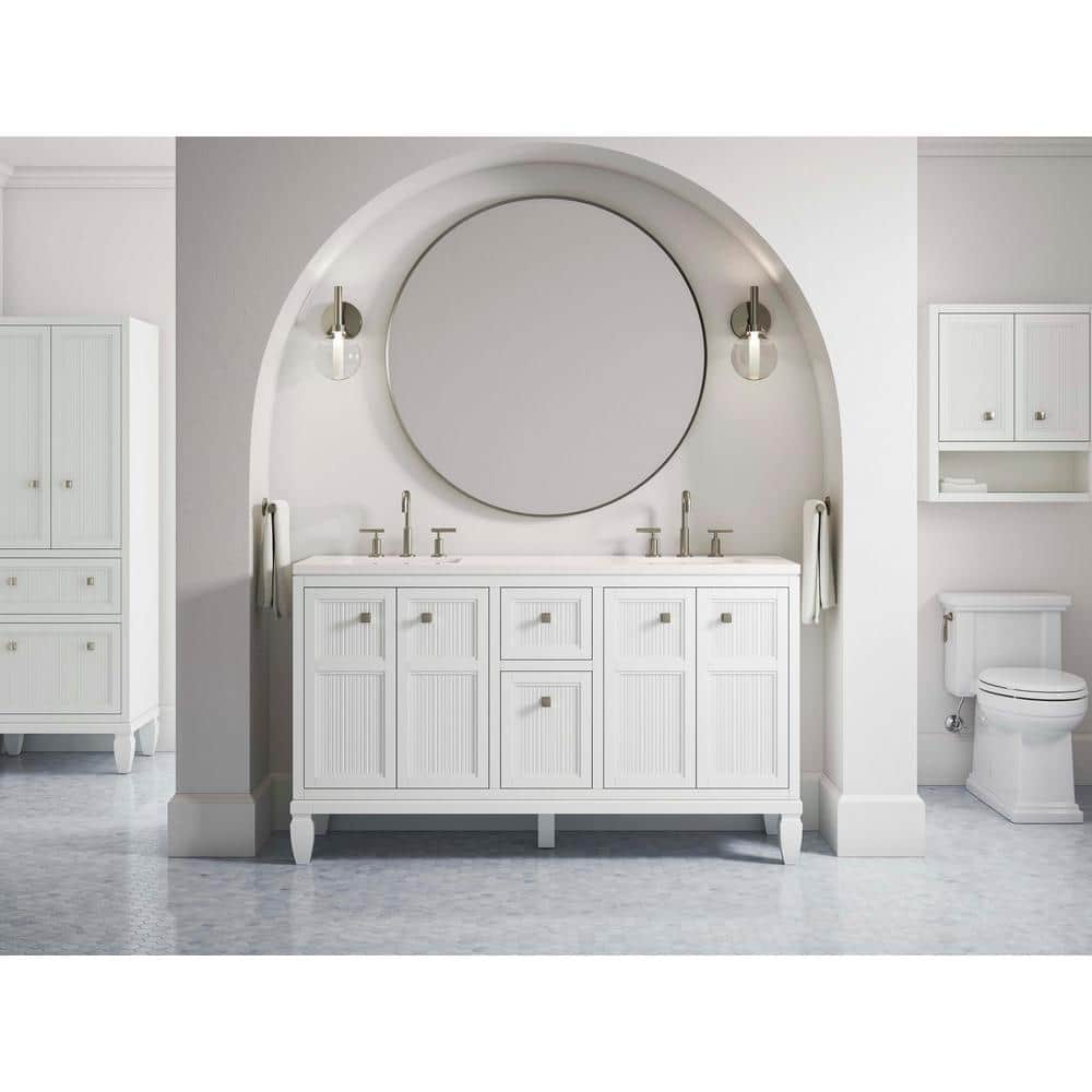 A single green leaf against a white background.