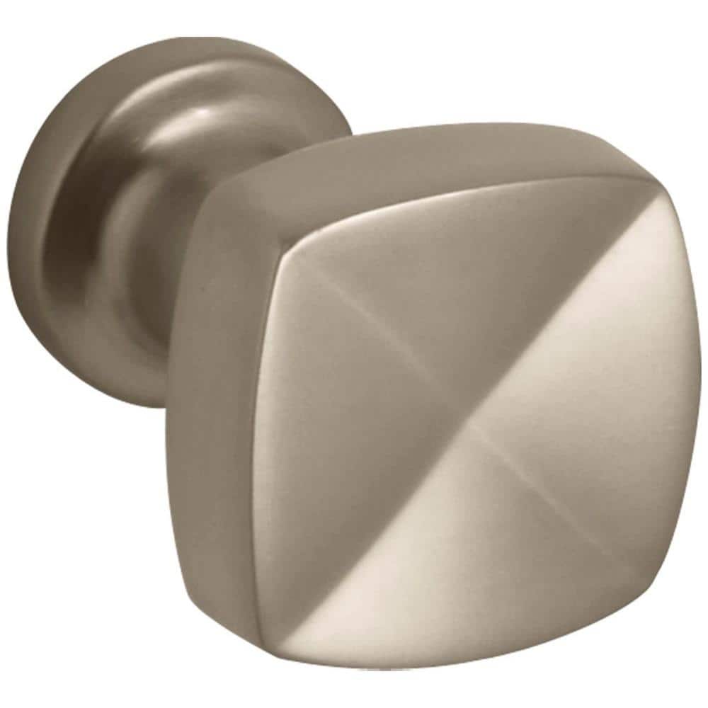 A single green leaf against a white background.