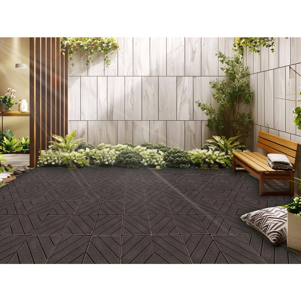 A single green leaf against a white background.