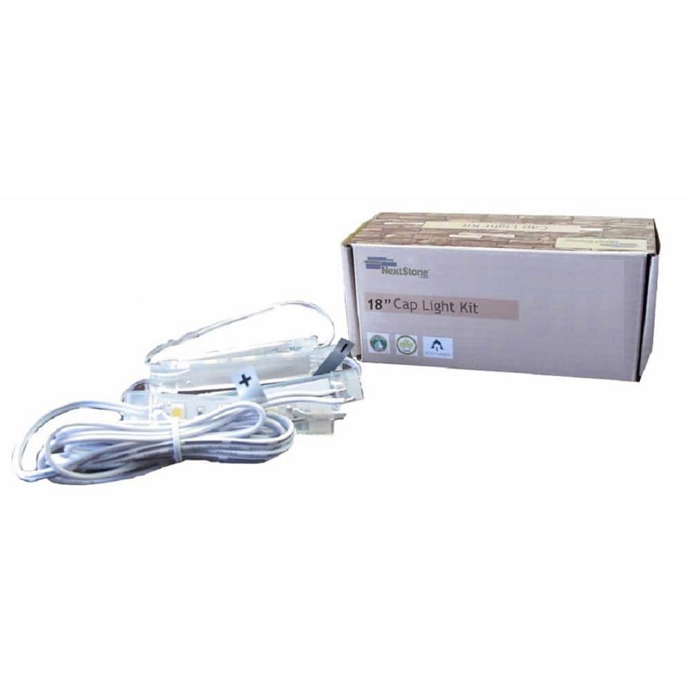 A single green leaf against a white background.