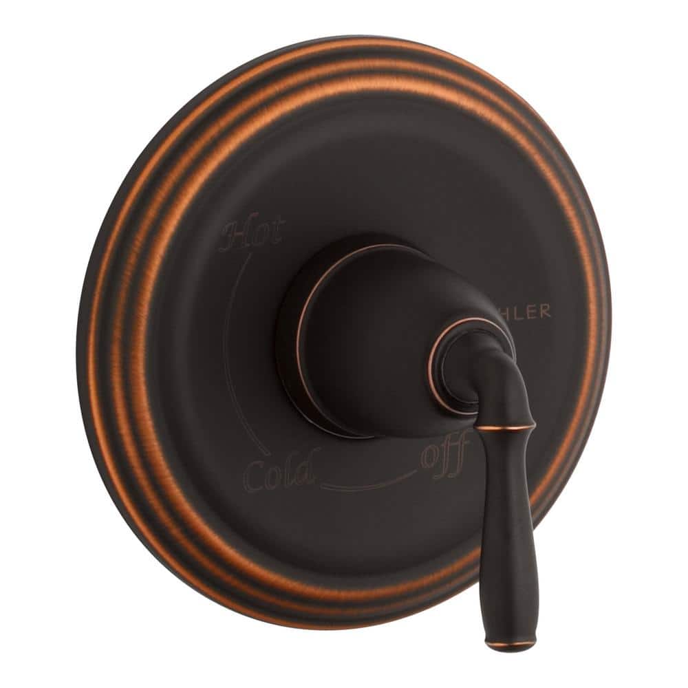 A single green leaf against a white background.