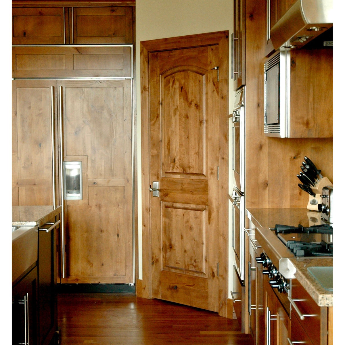 30 in. x 80 in. Rustic Knotty Alder 2-Panel Top Rail Arch Solid Core Wood Stainable Interior Door Slab