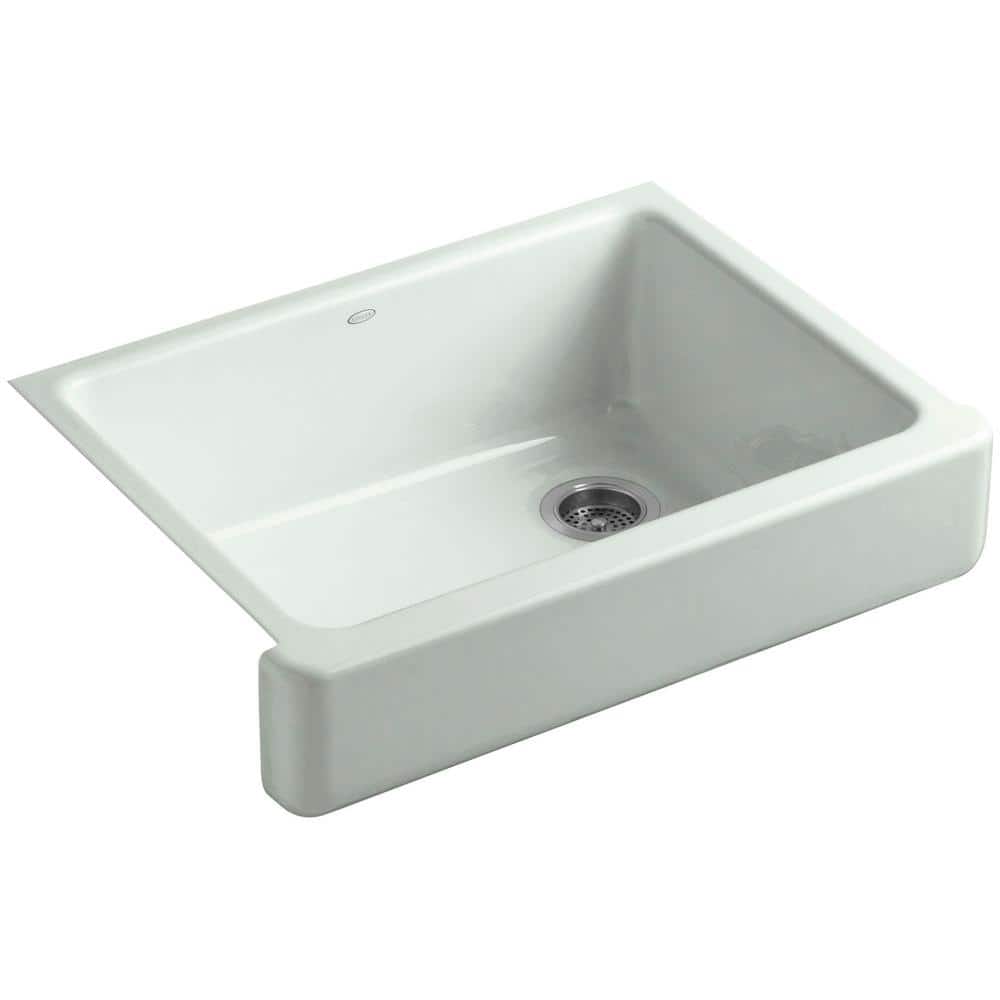 A single green leaf against a white background.