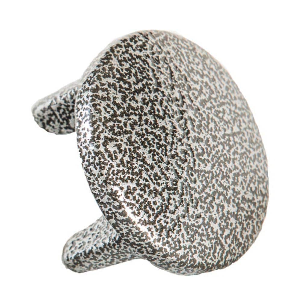 A single green leaf against a white background.