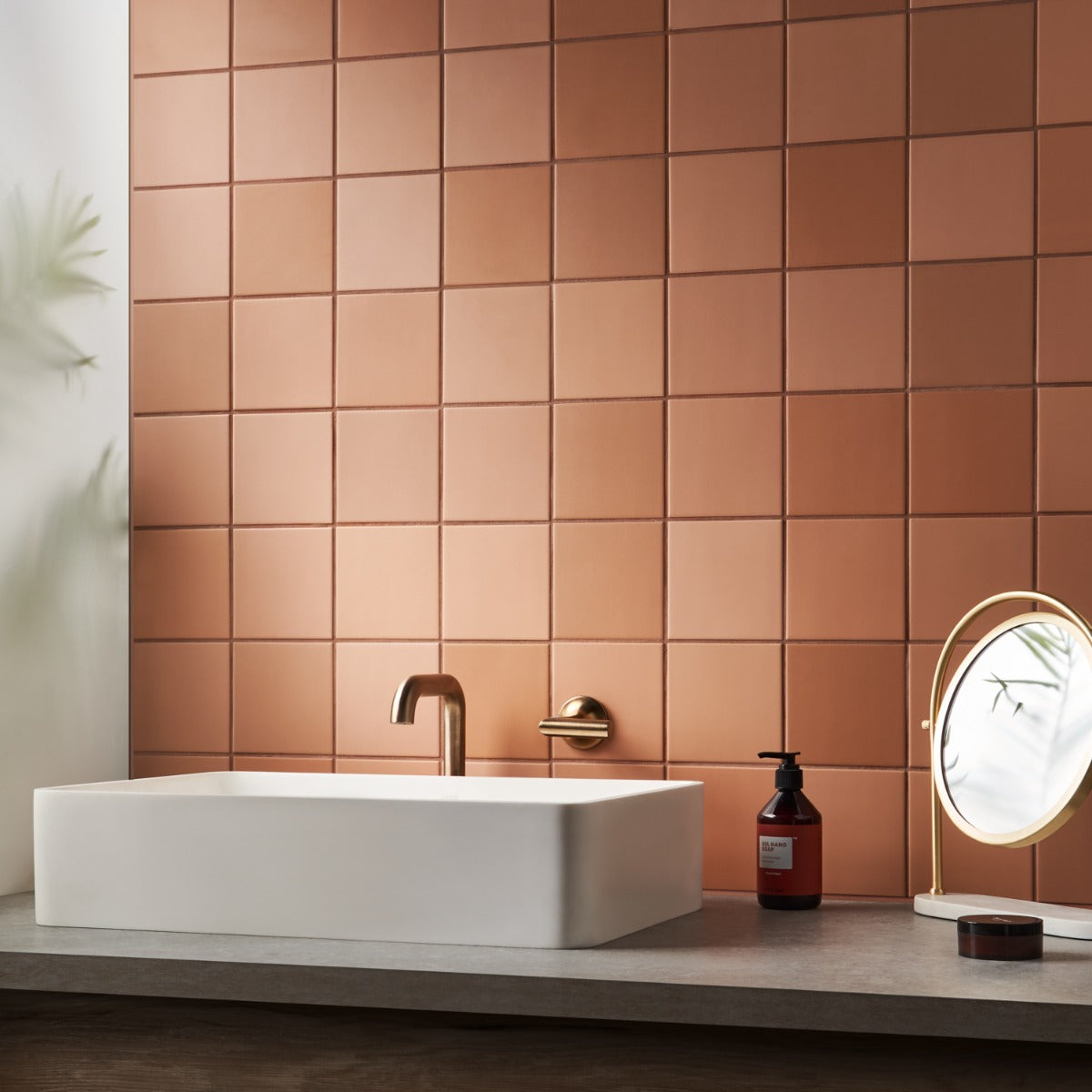 A single green leaf against a white background.