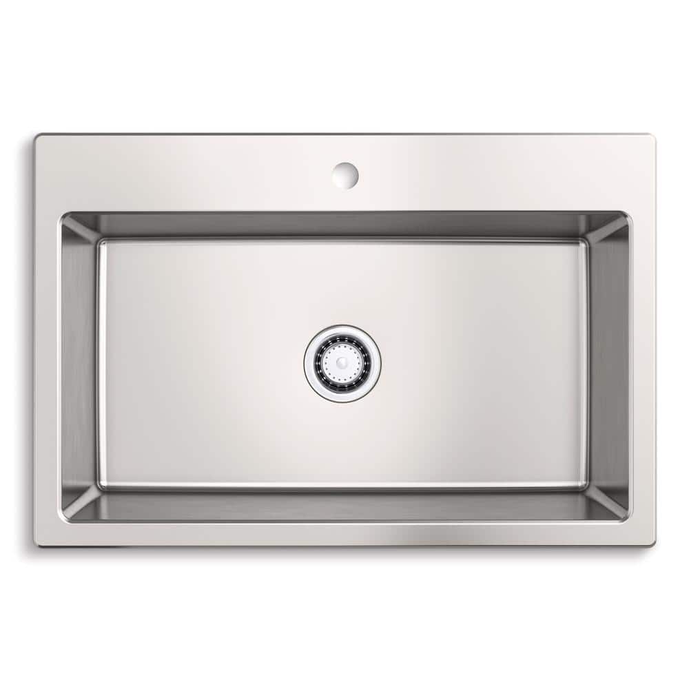 A single green leaf against a white background.