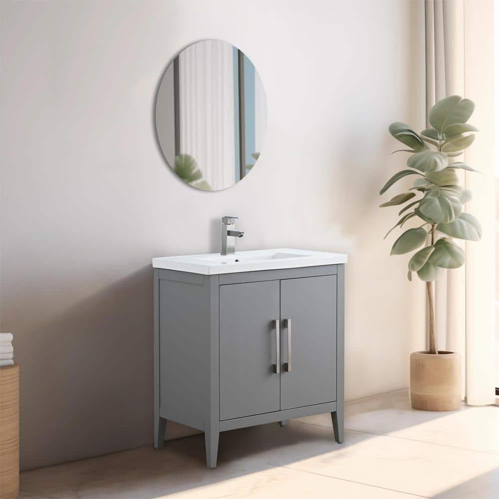 A single green leaf against a white background.