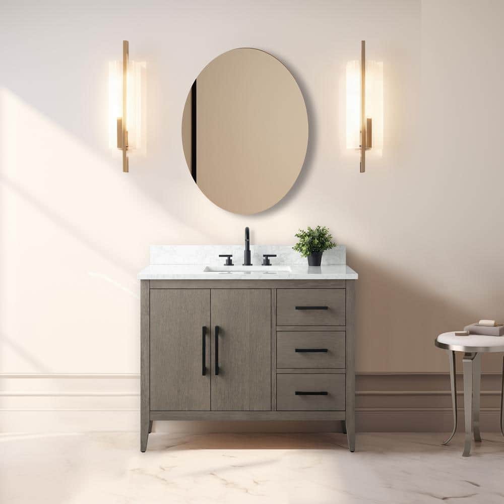 A single green leaf against a white background.