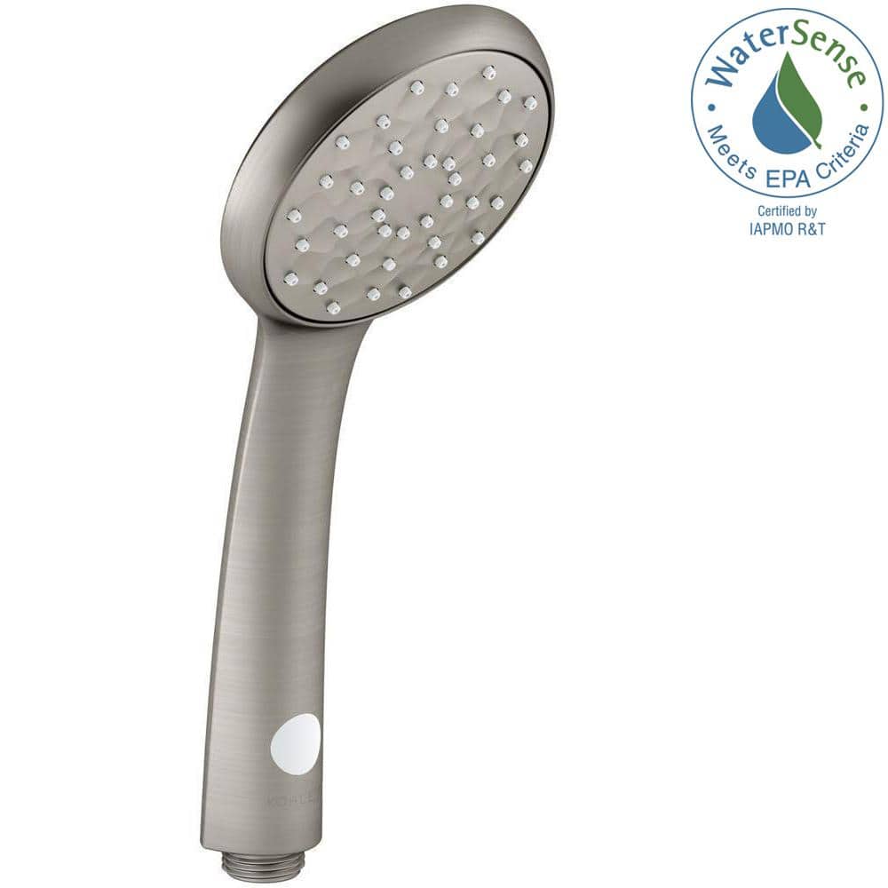 A single green leaf against a white background.