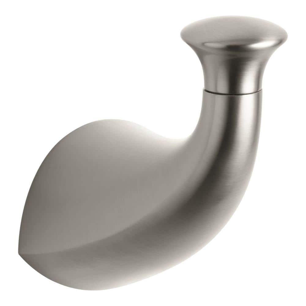 A single green leaf against a white background.