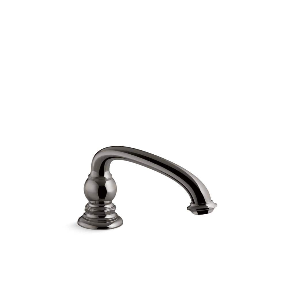 A single green leaf against a white background.