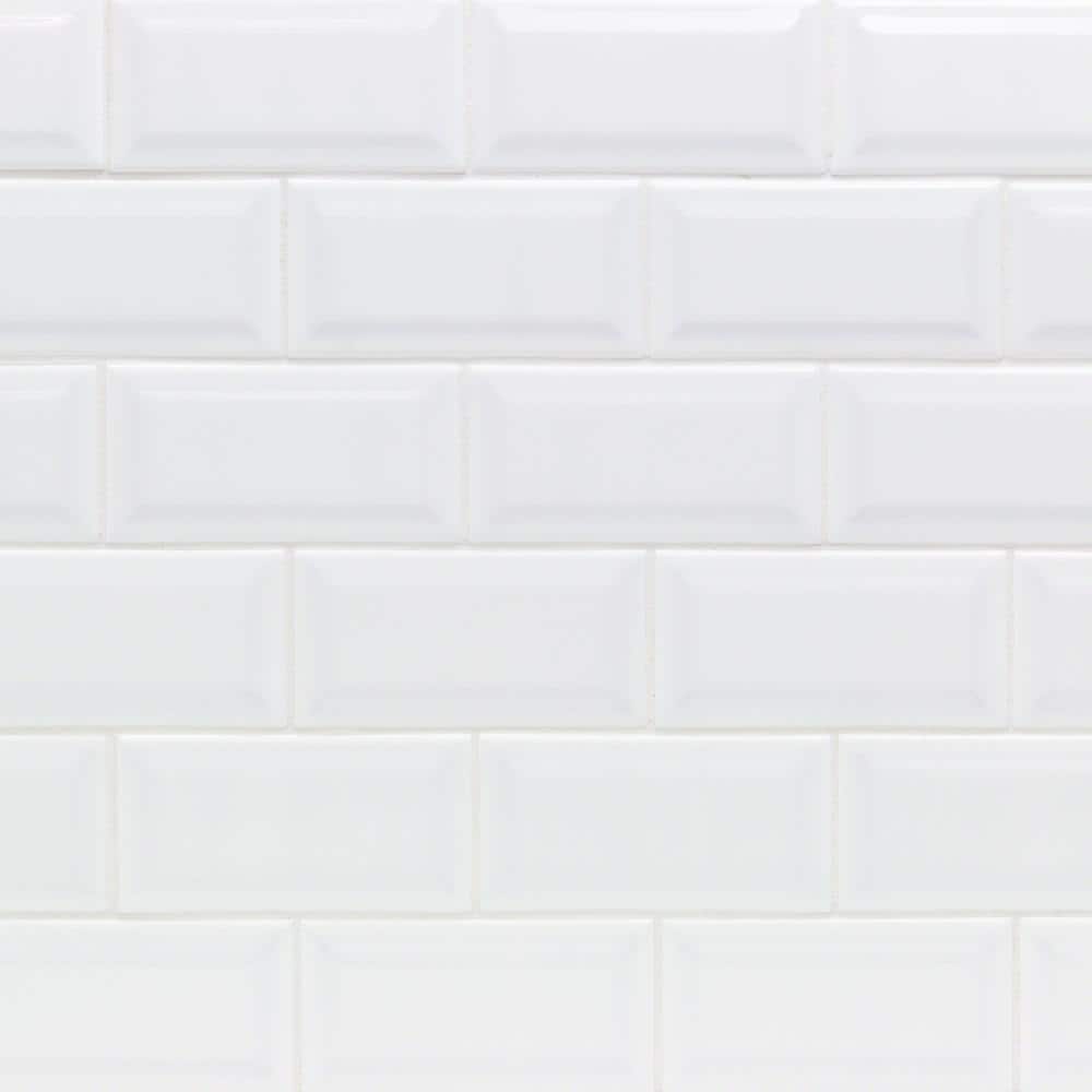 A single green leaf against a white background.