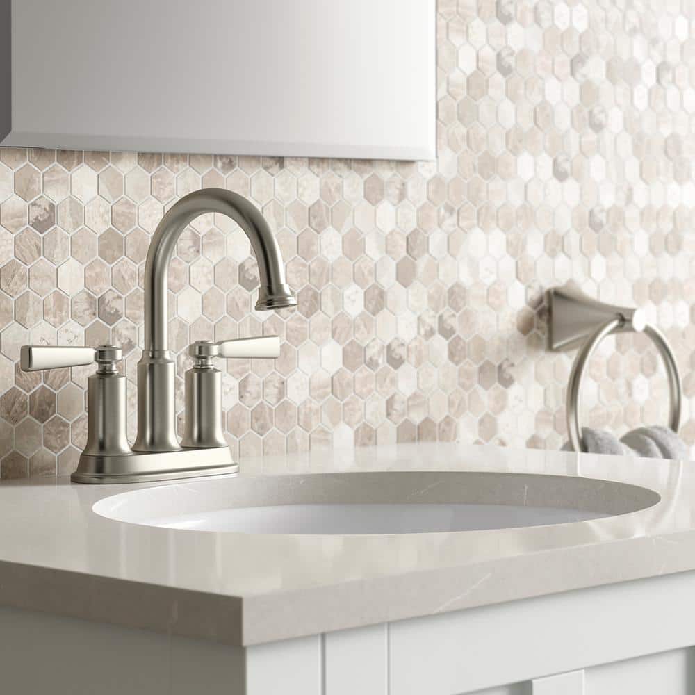 A single green leaf against a white background.