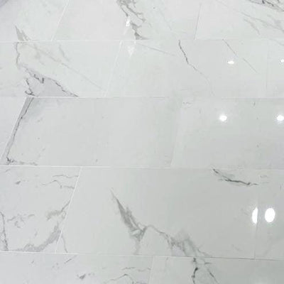 Carrara 12 in. x 24 in. Polished Porcelain Floor and Wall Tile (448 sq. ft./Pallet)