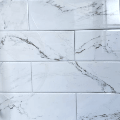 Marble Manor Calacatta 4-in x 12-in Glossy Ceramic Marble Subway Wall Tile (0.38-sq. ft/ Piece)